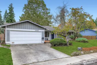 2 Car Garage with 2 car parking pad.