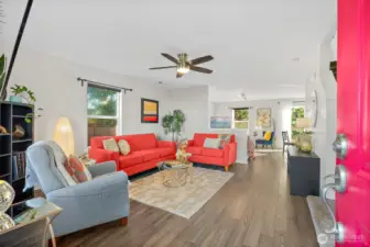 Formal living room off of entry, open to family room/dining