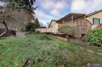 Notice the terraced beds on side yard.