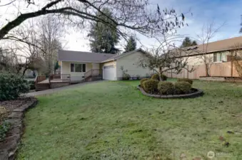 View from the side yard looking back at home.  Notice the private side door entry.