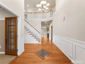 View from entry, cathedral ceiling, den to left (or 5th bedroom).