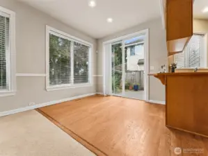 Dinette next to kitchen and sliding door to patio