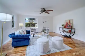 Warm and inviting living room offering flexible space for relaxing or hosting guests.