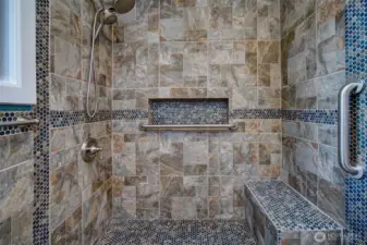 Beautiful tiled shower on main floor