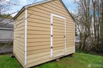 Shed is perfect for gardening tools or a space to pursue your hobbies