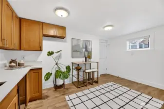 Lower level kitchen with stove and refrigerator hookups in place.