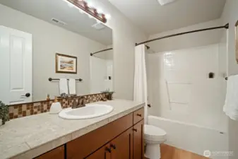 Hall bath with tub/shower.