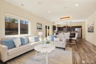 Open-concept family room, dining room and kitchen, great for entertaining.