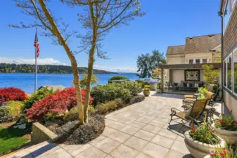 This home is designed for outdoor enjoyment with so many spaces to relax. Wonderful view of Mt. Rainer... hiding in the photo now but is big and bold beneath the clouds.