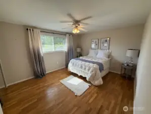 Spacious master bathroom- real hardwood floors