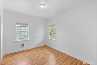 Front bedroom with new laminate flooring.