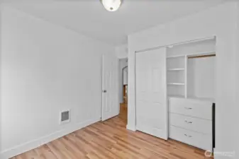 Second view of Primary showing built-in dresser in closet.