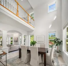 Gorgeous dining room with vaulted ceiling.