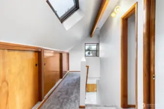 Long hall with skylight and tons of storage