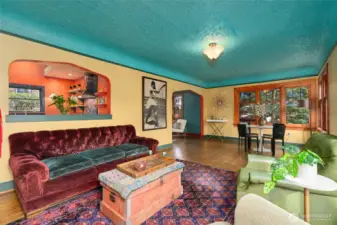 Low, multi-centered Tudor arches abound.