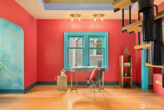 The second story features two bedrooms. This room features a lofted space with so much possibility and a light and airy feel amid its rustic charm.