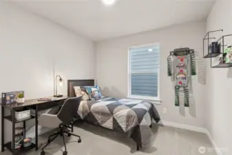 One of the secondary bedrooms. Materials, colors, and finishes will vary. See site agent for details