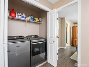Laundry day is a breeze with the included, high-efficiency washer and dryer, neatly tucked away in a dedicated closet with storage.