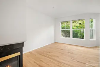 Bright and airy living room with large windows that fill the space with natural light