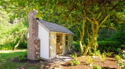 The sleeping cabin is a perfect retreat with a cedar roof.