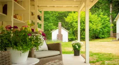 Looking from the potting shed to the sleeping cabin.