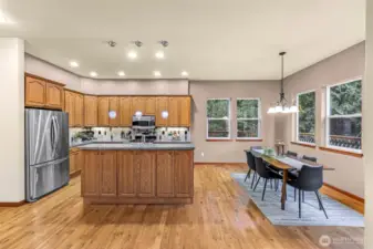 Granite countertops have blue specs to glisten the kitchen