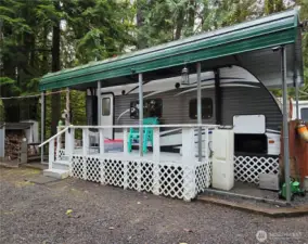 Newer Apen Trail RV with metal cover