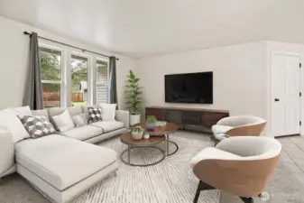 Looks great, ready for your personal touch! Plenty of room for comfy seating and a TV. (Virtual staging)