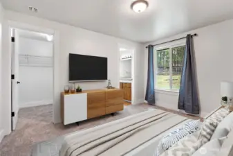 The primary suite features a walk-in closet, plus a three-piece bath.  (Virtually staged)