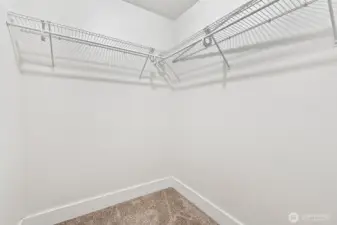 Walk-in primary closet.