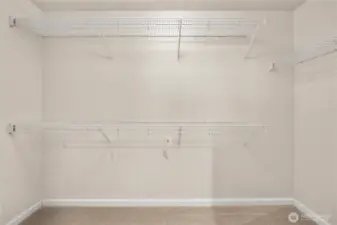Walk-in closet offers great storage.