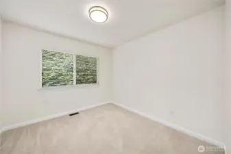 Additional bedroom offers flexibility and comfort.