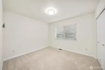 Additional bedroom offers flexibility and comfort.