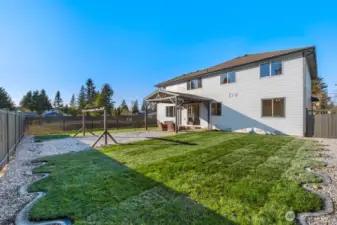Large fully fenced grassy yard perfect for pets and play time!