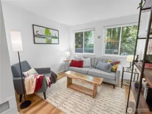 The living room is a good size with plenty of natural light from the two large windows. The bump out offers additional space and allows for multiple room configurations.