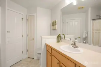 The main bath has a tub/shower combo plus a linen closet for extra storage.