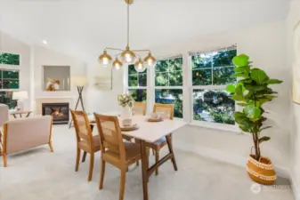 Another view of the dining room with lots of windows.