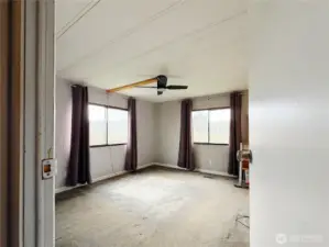 Primary Bedroom (with in window AC Unit that will stay)