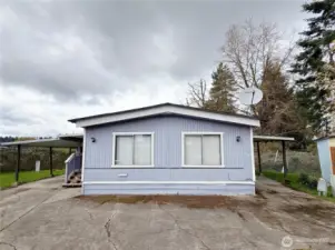 Unit 36, Tucked Away in the back of the neighborhood in a quiet cul-de-sac, with covered parking spaces on both sides