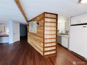 Living Room off of kitchen and entry with heat producing electric fireplace
