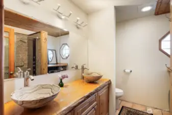 Primary bathroom with laundry