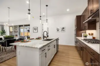 Quartz countertops on perimeter and island