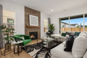Great room with floor to ceiling tile surround and gas fireplace
