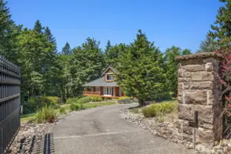 One of two gated entrances to the property