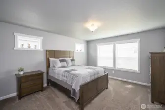 Cozy primary bedroom suite.