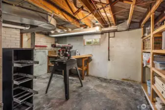 Workshop Area - shelving - high ceilings.  Could be more!