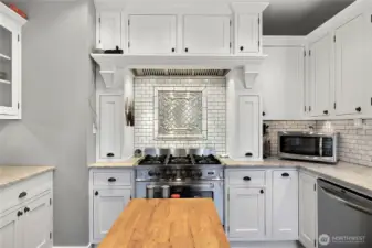 Beautiful tile work and cabinetry.