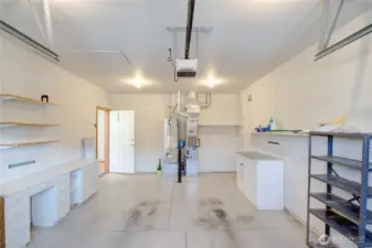 One car garage has storage shelving