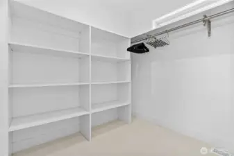Downstairs primary walk in closet