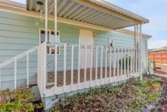 Back porch that leads to utility room